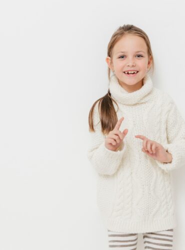 attractive small female child in warm winter sweat 2022 05 04 22 50 50 utc 2